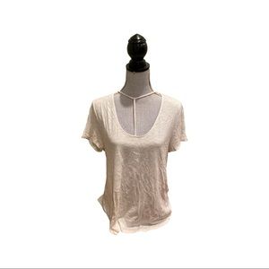 White tee with neck cutouts